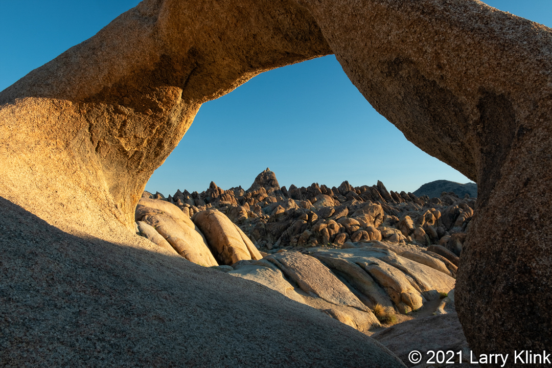 Image of a bolder field from the back of Mobius Arch in the Alabama Hills